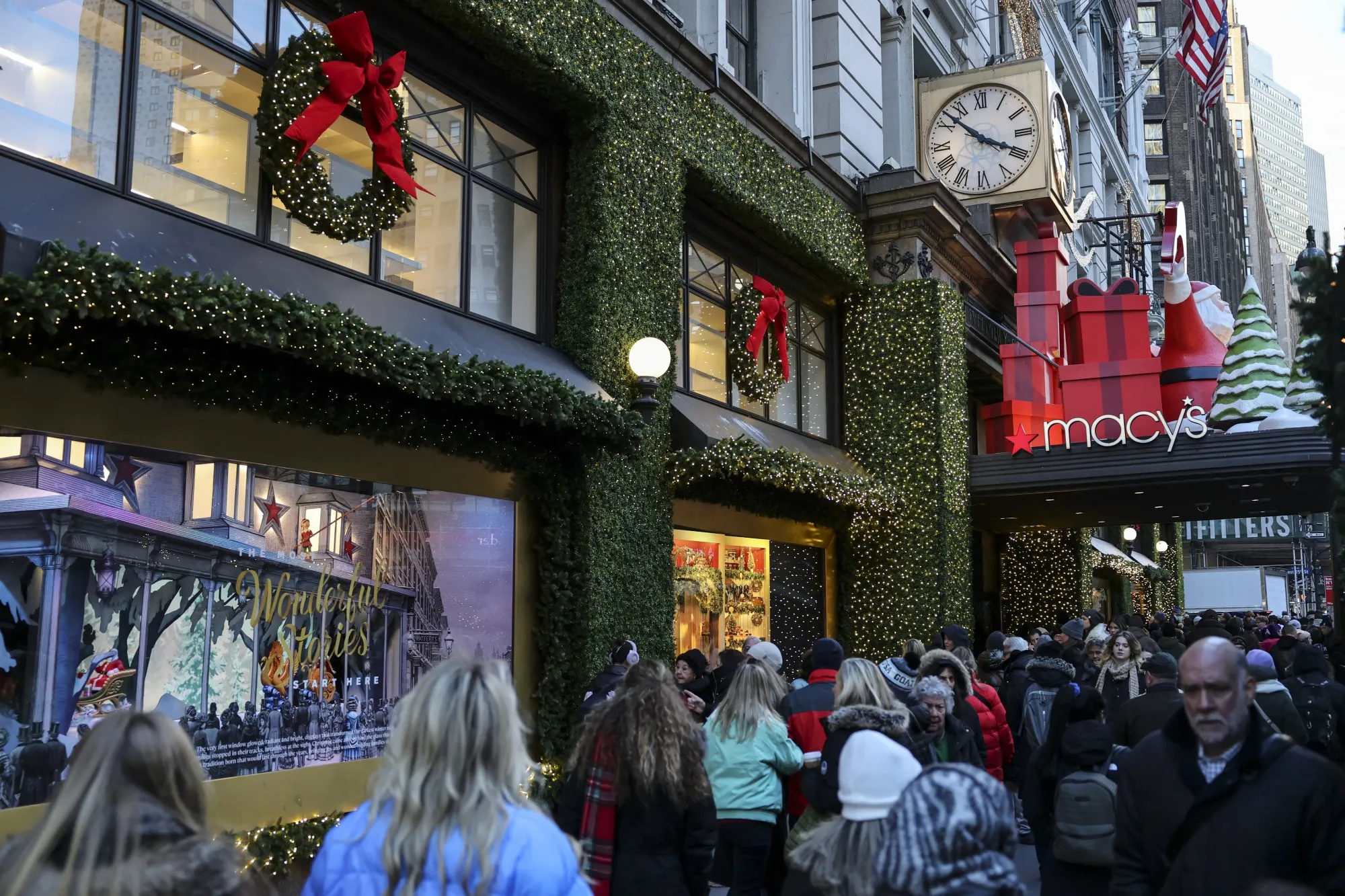 The Macy's storefront is decorated for Christmas as people make their way through Herald Square on December 11, 2025 in New York City.&nbsp;