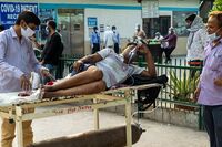 World's Biggest Covid Crisis Threatens Modi's Grip on India