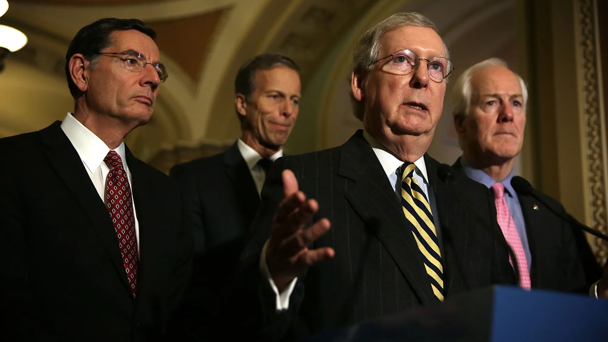 Mitch McConnell speaks during a news briefing.
