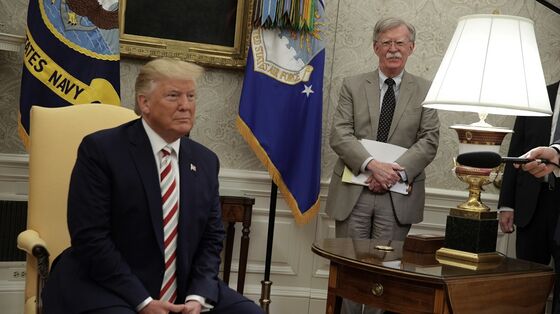 Trump Signs Rebuke of China Over Muslims Amid Bolton Book Claims