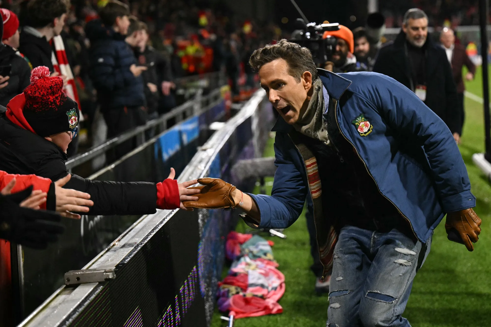US actor and Wrexham owner Ryan Reynolds greets fans ahead of a match this season.