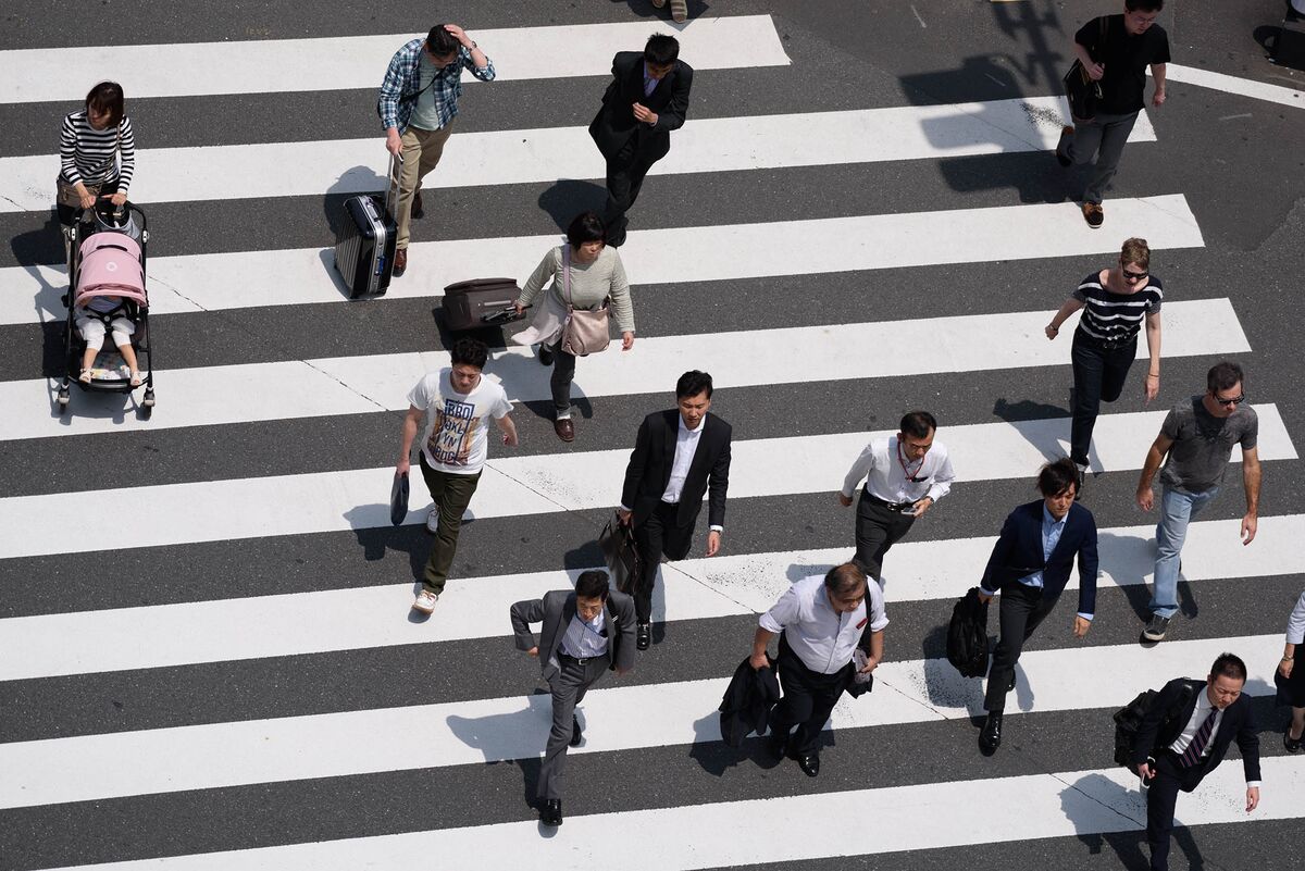 モーレツ返上なるか 電通社員の死が変えるサラリーマンの働き方 Bloomberg