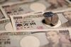Japanese 100 yen coins and 10,000 yen banknotes are arranged for a photograph in Kawasaki, Kanagawa Prefecture, Japan, on Saturday, July 7, 2018. Japan’s currency rose against every single Group-of-10 peer in the first half, with an average 4.8 percent gain. Now a combination of U.S. protectionism, European populism and emerging market turmoil threatens to push the yen even higher in the second half, according to analysts.