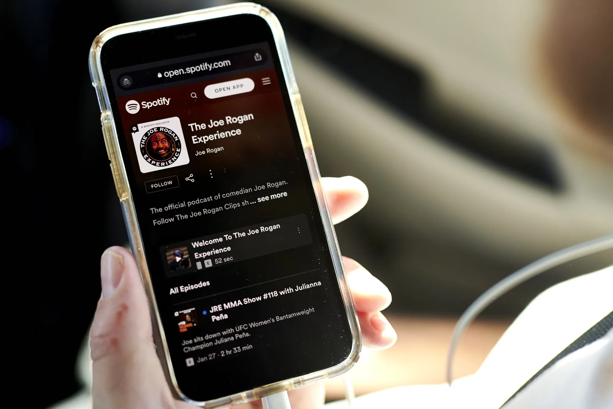 The Joe Rogan Experience Spotify website page on a smartphone.