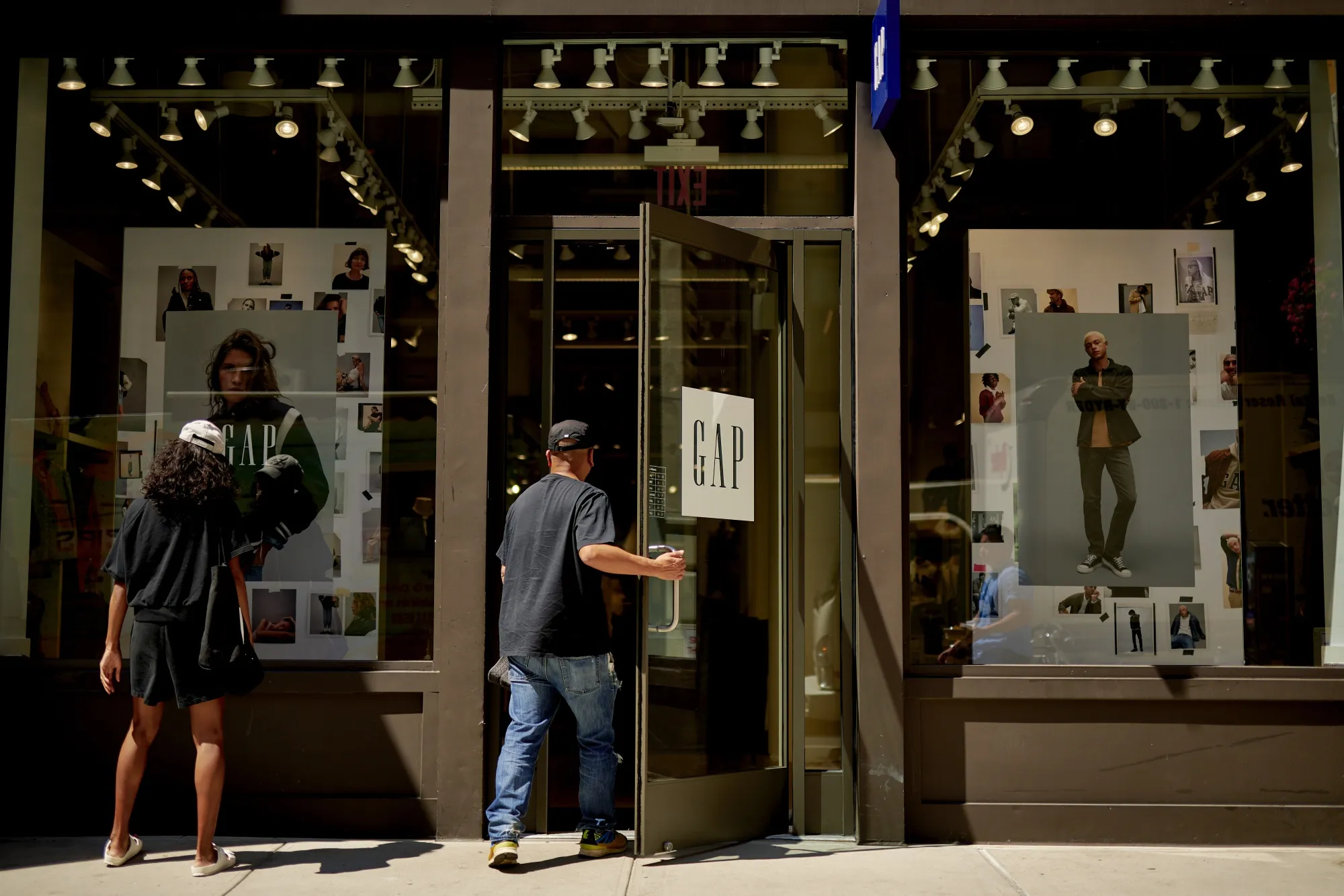 A customer enters a Gap retail store in New York.