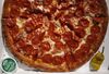 A Papa John's International Inc. pepperoni pizza pie sits arranged for a photograph in Shelbyville, Kentucky, U.S., on Friday, Feb. 10, 2017. Papa John's is scheduled to release earnings figures on February 21.