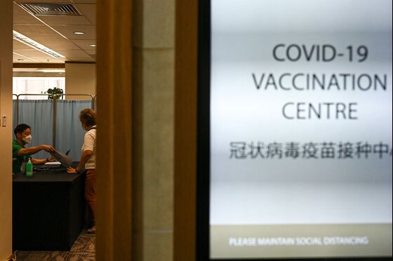 Singapore Shifts Covid Focus to Hospitalizations as Cases Set Daily Record