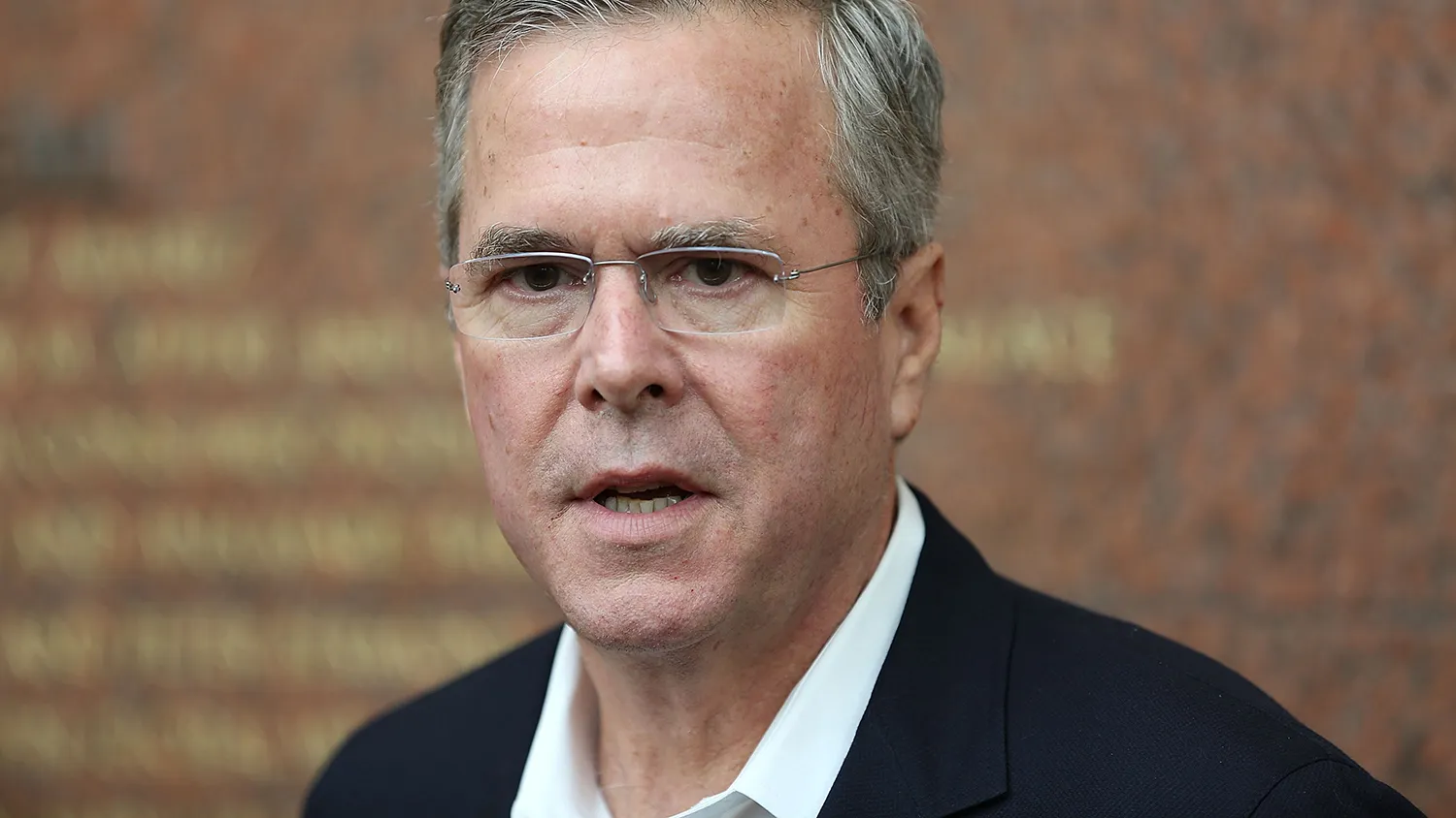 Former Florida Governor Jeb Bush and possible Republican presidential candidate speaks to the media after presenting awards to the 2015 Arts for Life! scholarship winners at the Adrienne Arsht Center for the Performing Arts in Miami-Dade County on June 5, 2015 in Miami, Florida.
