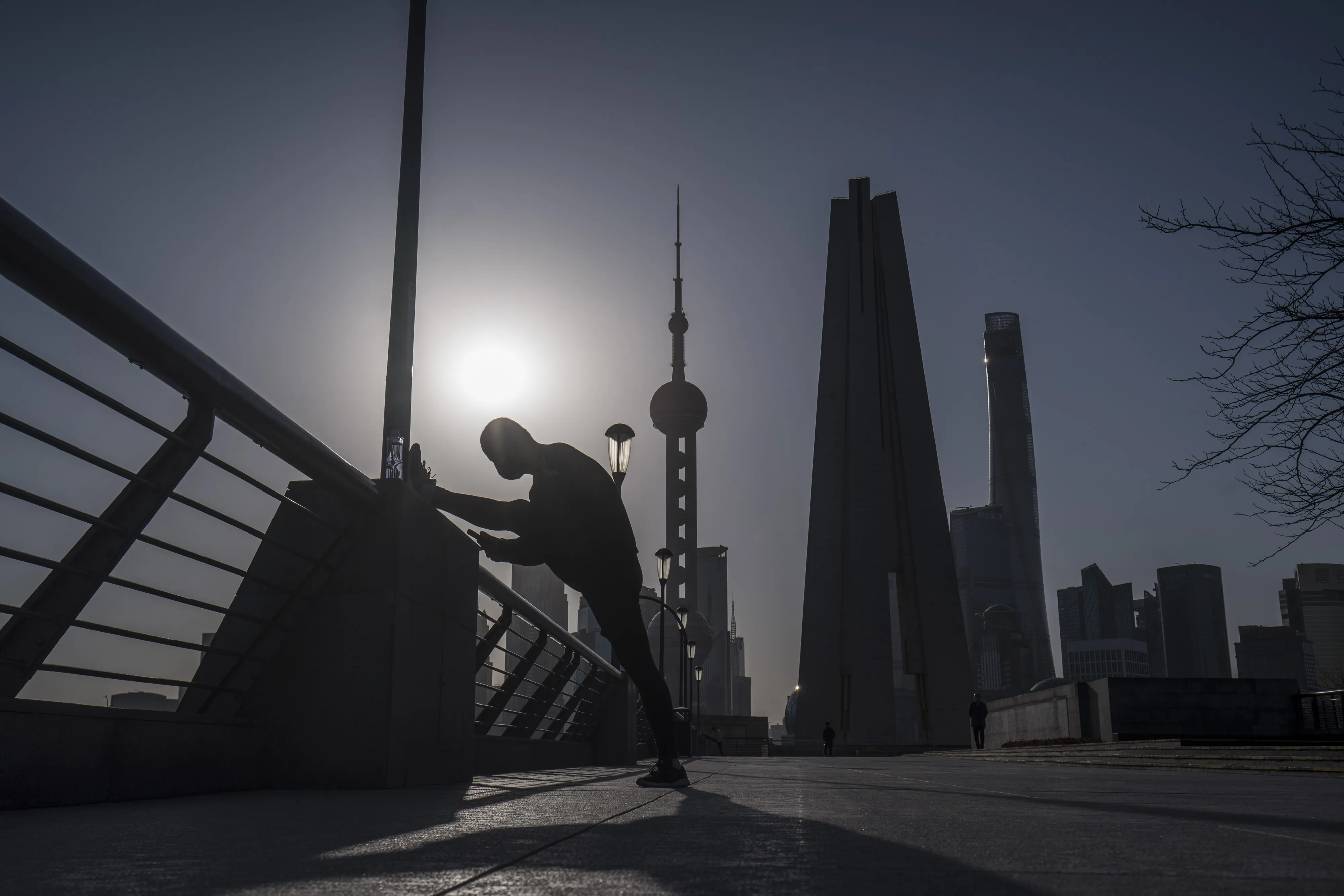 Office Workers in Shanghai as Premier Says Most of China Is Returning to Normal