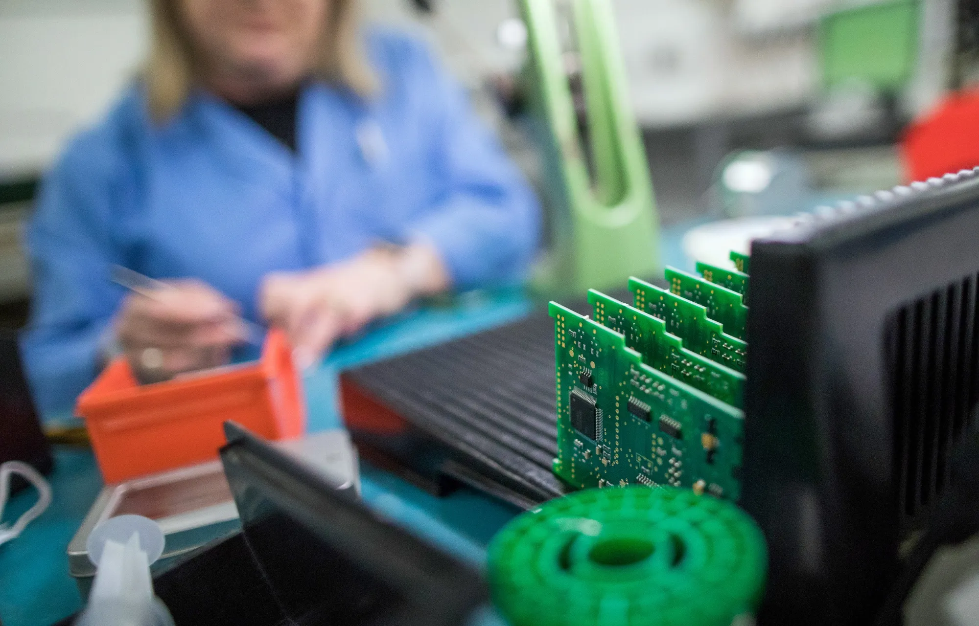 Printed circuit boards containing integrated circuit microchips at a manufacturer in the UK.