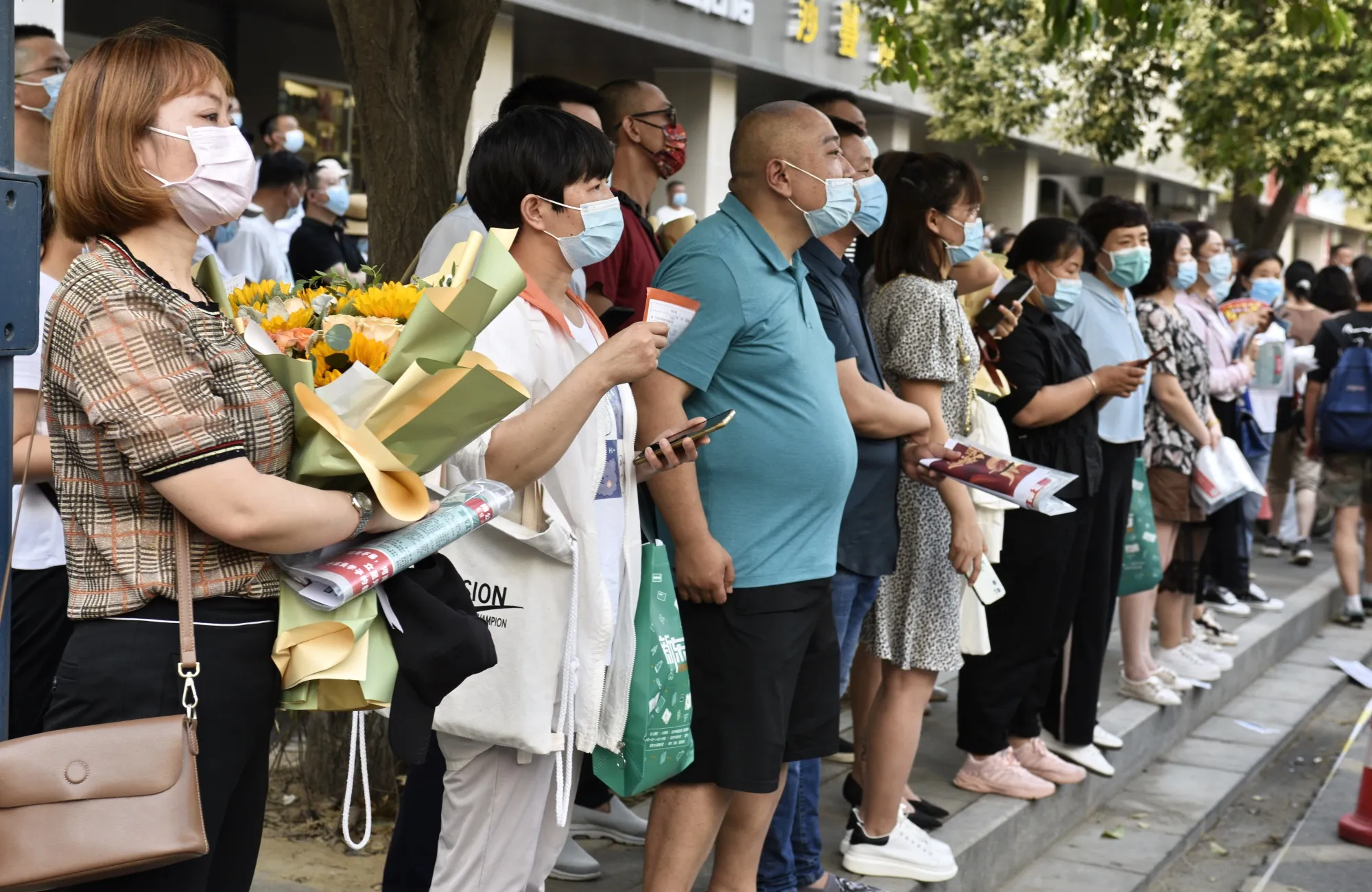 Parents in Zhengzhou awaiting their children to complete the “gaokao.”