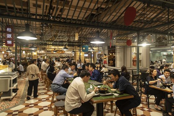 The Post-Covid Trading Floor Is Here — With Buffet Lunches, No Masks