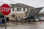 A carport hangs from power-lines after Tropical Storm Nicholas moved through the area&nbsp;in Houston, Texas, on Sept. 14.