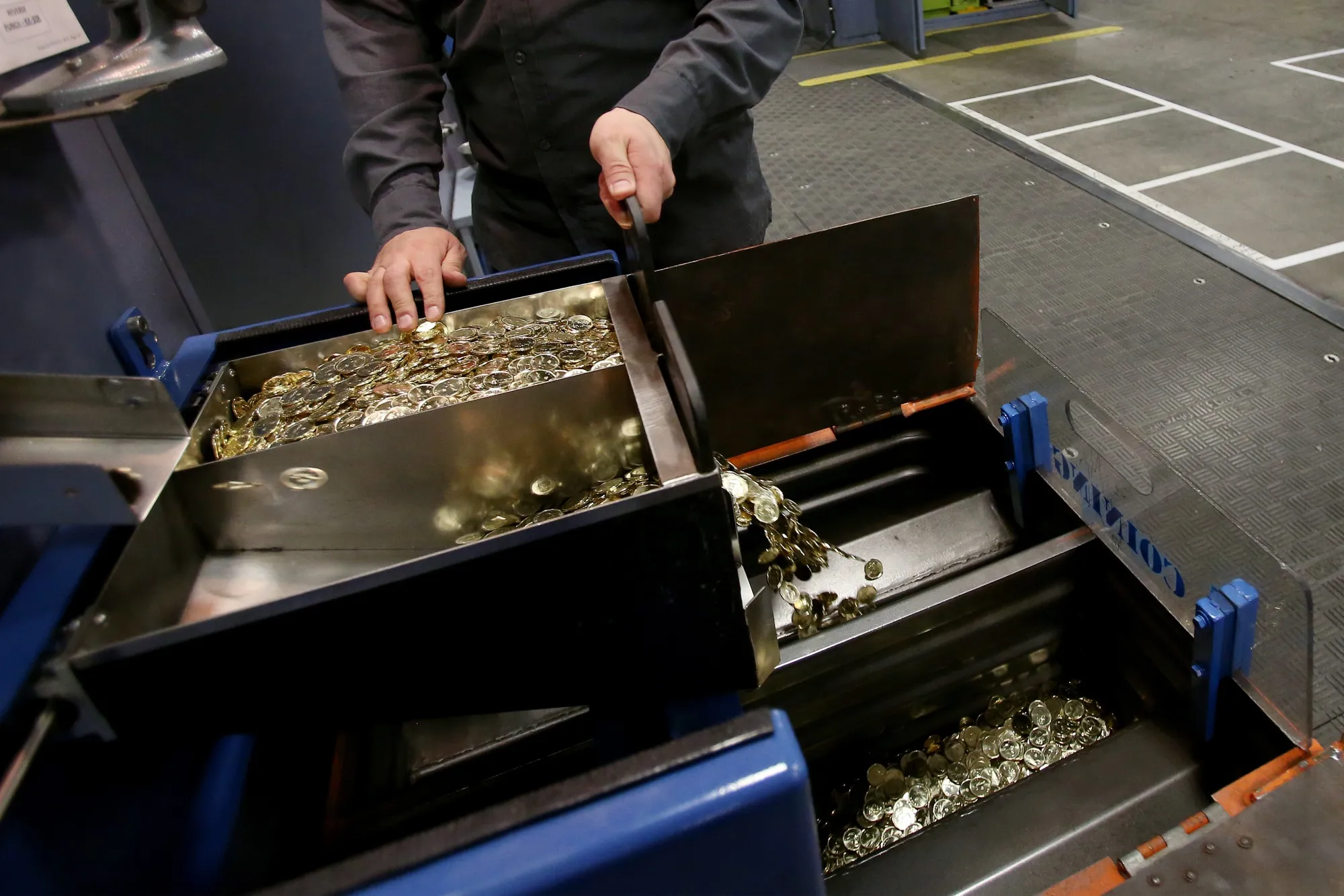 Operations At The Royal Canadian Mint As Loonie Steady Before Home Price Data