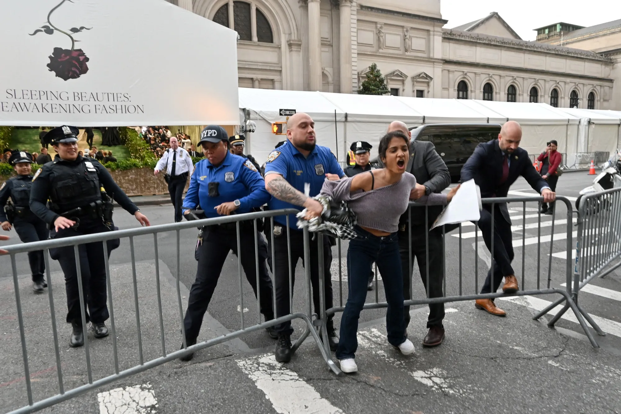 Police tackle a pro-Palestinian protester&nbsp;disrupting the arrivals for the 2024 Met Gala at the Metropolitan Museum of Art in New York on May 6.