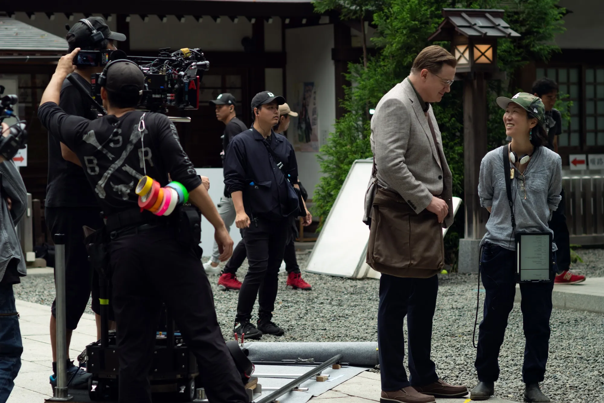 Director Hikari with Brendan Fraser on the set of Rental Family.&nbsp;