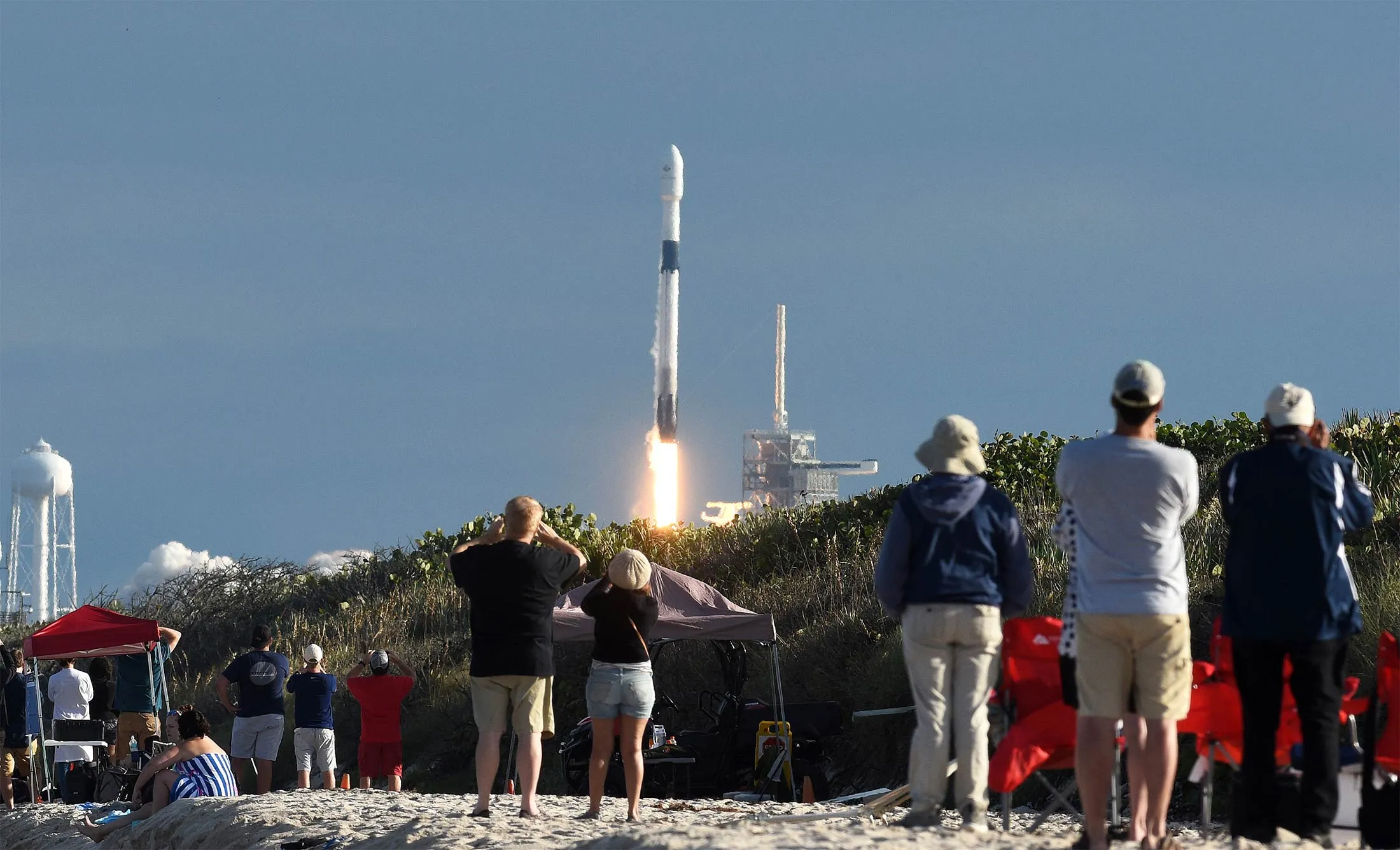 Spectators watch&nbsp;as a SpaceX Falcon 9 rocket successfully launches&nbsp;from the Kennedy Space Center in Florida, on Nov. 15.