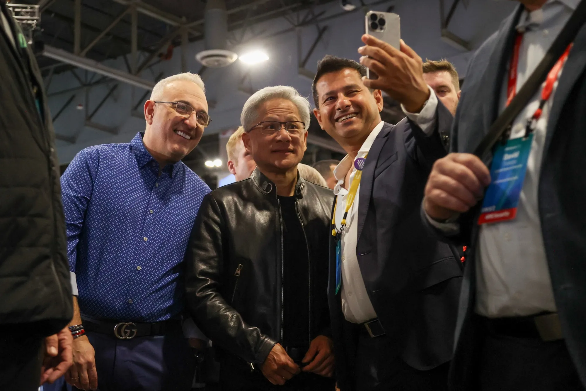 Nvidia CEO Jensen Huang, center.