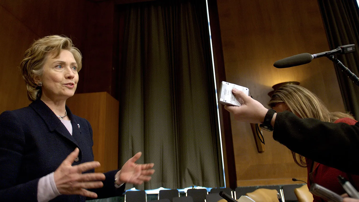 Senator Hillary Clinton (D-NY), speaks to reporters at the conclusion of the Senate Armed Services Committee open briefing on Dubai Ports World's proposed acquisition of P&amp;O Steamship Navigation-run ports at the U.S. Capitol on February 23, 2006 in Washington, D.C.
