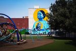 A mural in downtown Stockton celebrates the guaranteed income project.