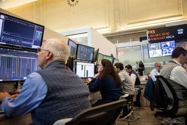 Traders On The Floor Of The NYSE As Trump Announces New Tariffs