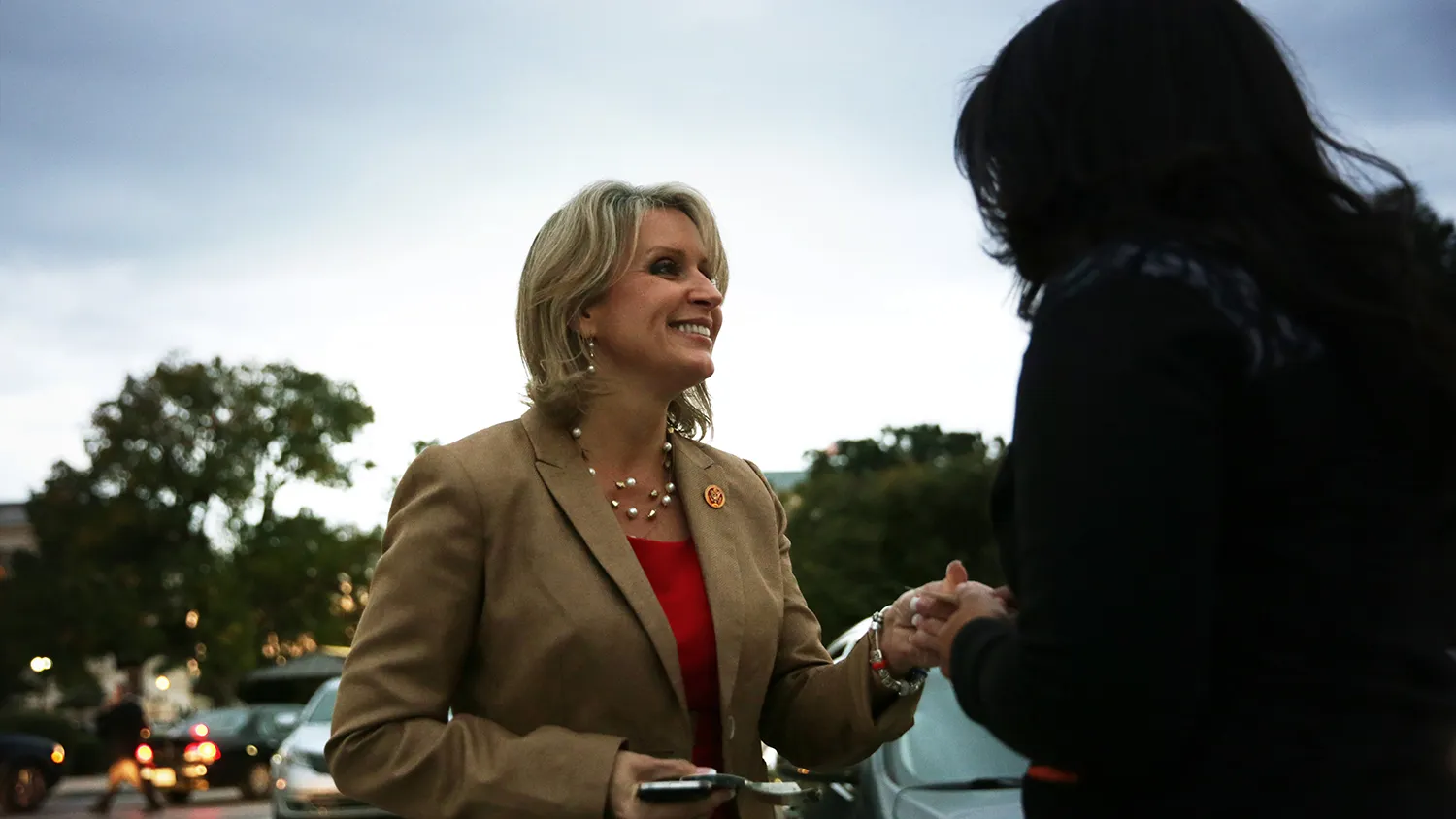 U.S. Rep. Renee Ellmers (R-NC) is greeted by an immigration reform activist in front of the U.S. Capitol October 23, 2013 on Capitol Hill in Washington, DC.
