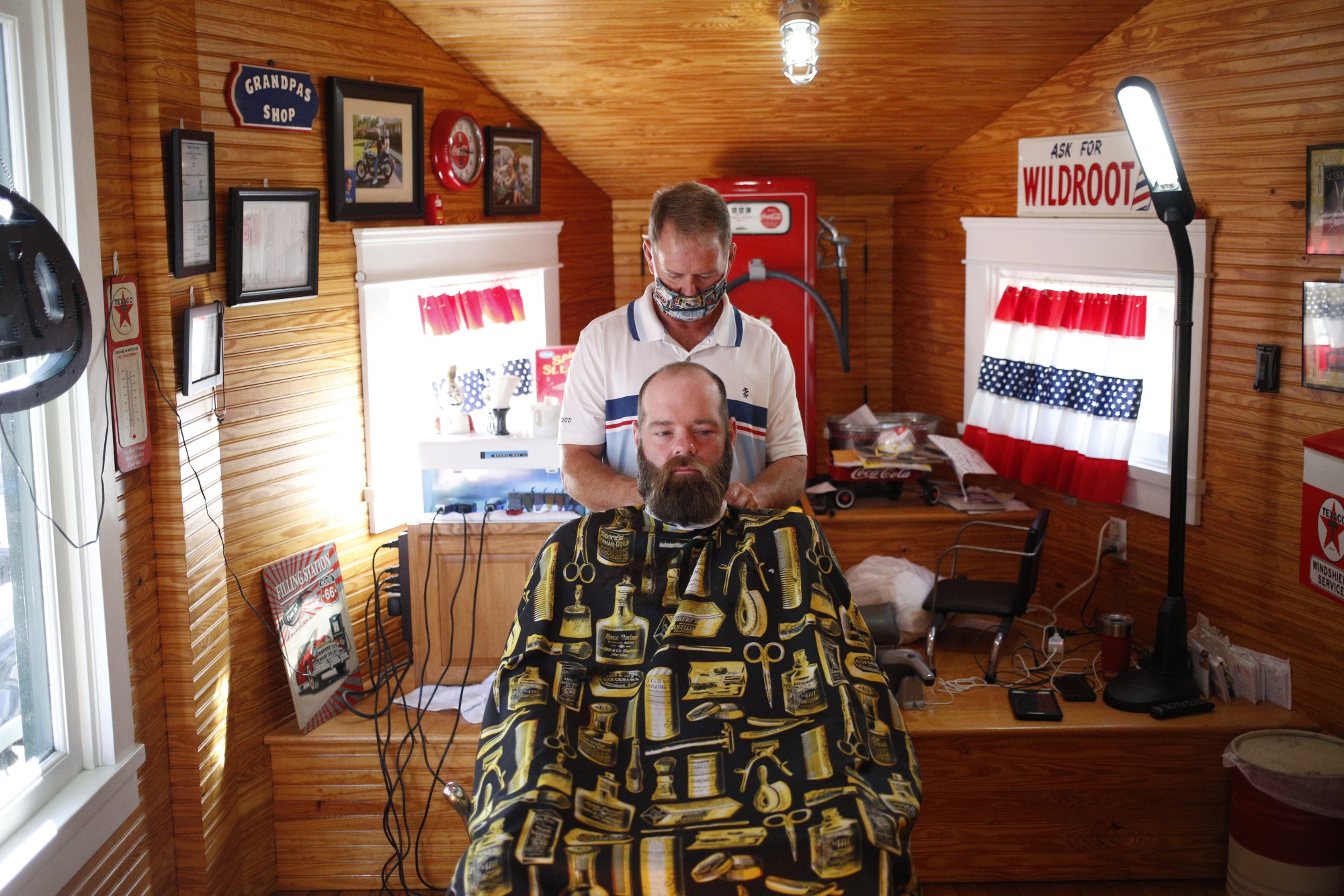 A customer gets a haircut at John's Barber Shop in Knoxville, Tennessee,&nbsp;on May 1.&nbsp;