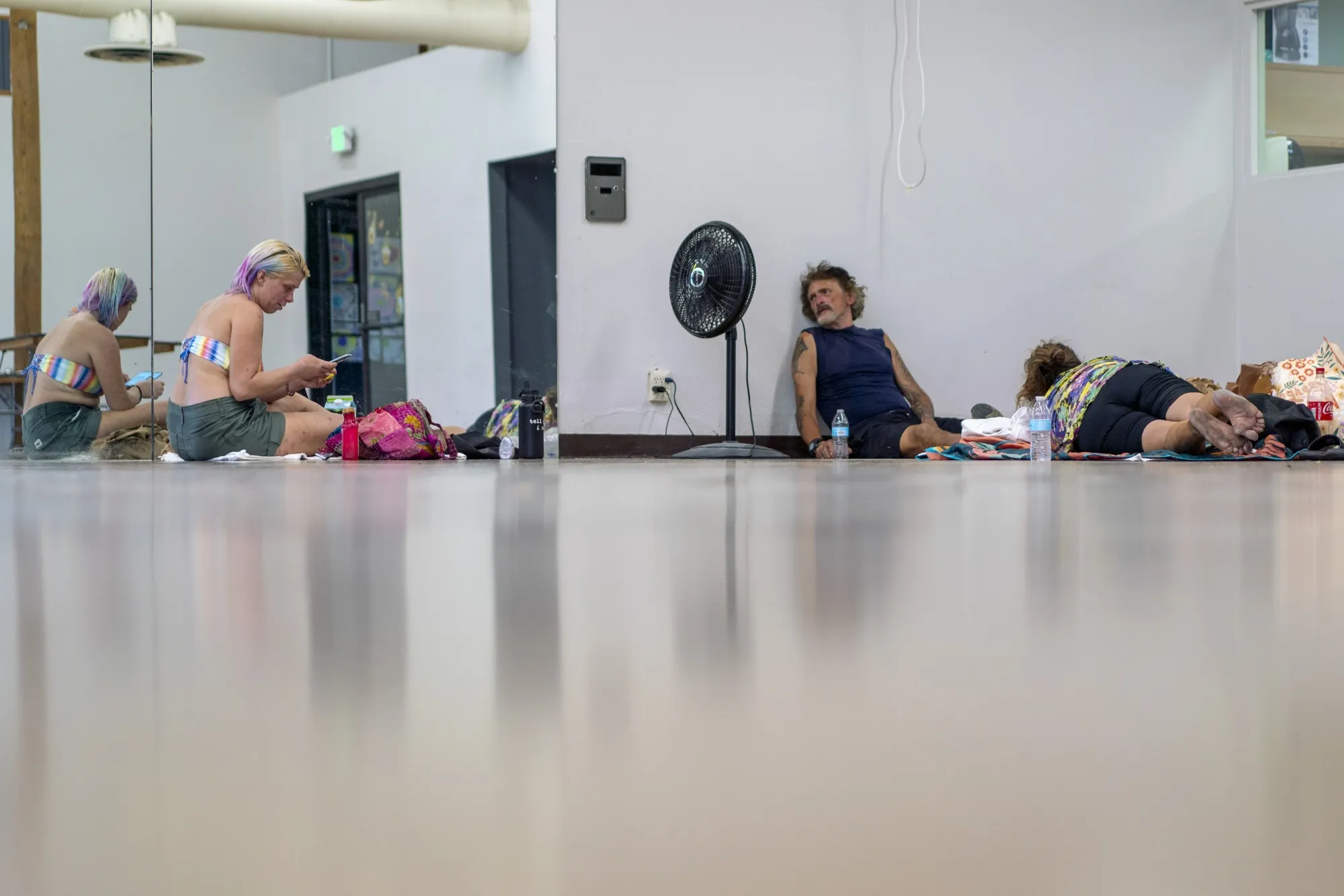 Residents rest inside a cooling center during a heatwave in Palm Springs, California, US.