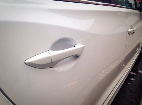 The door handles are artfully pointed at the ends.