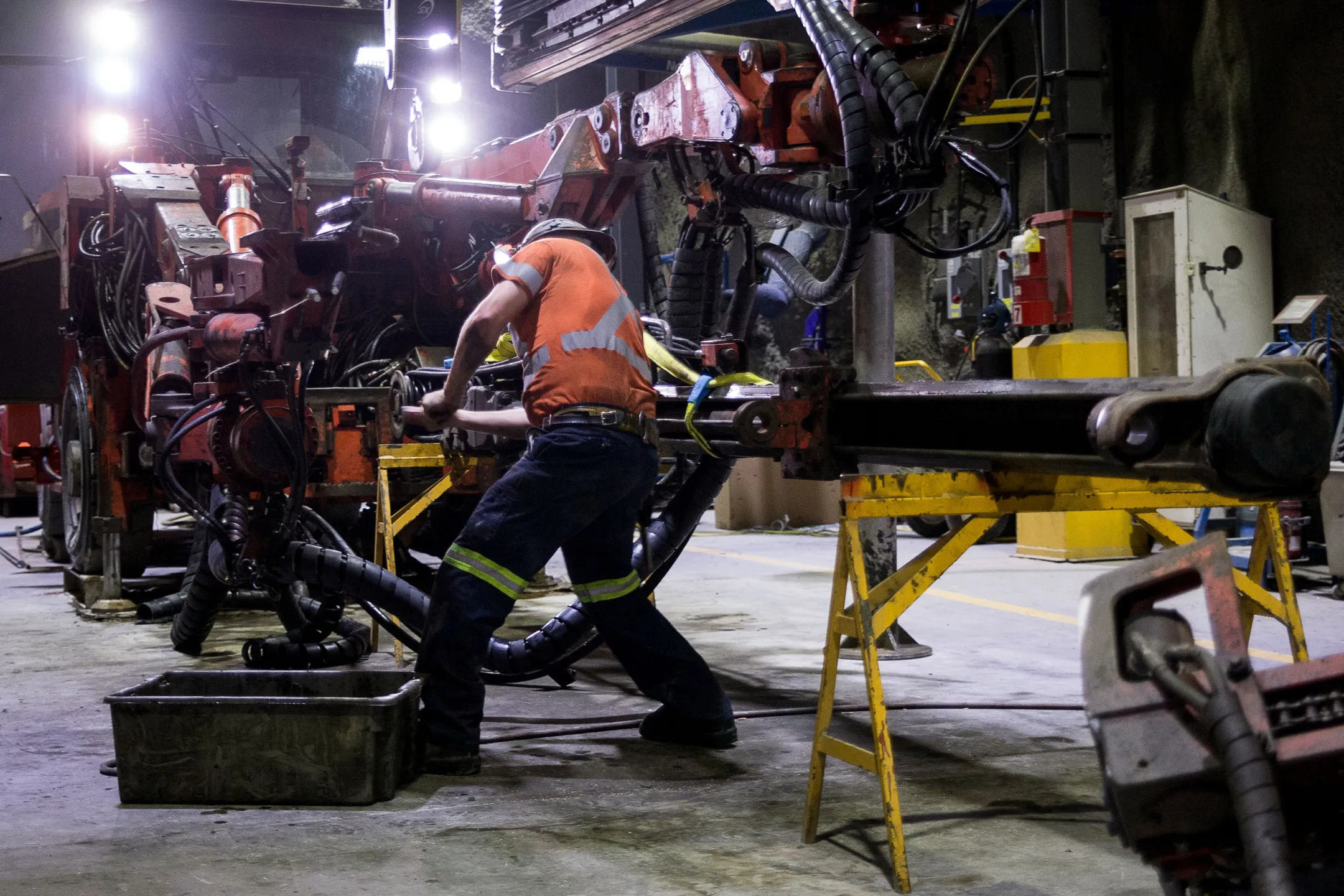 A contractor works on a machine at the underground Agnico Eagle Mines Ltd. LaRonde mine in Malartic, Quebec, Canada.&nbsp;