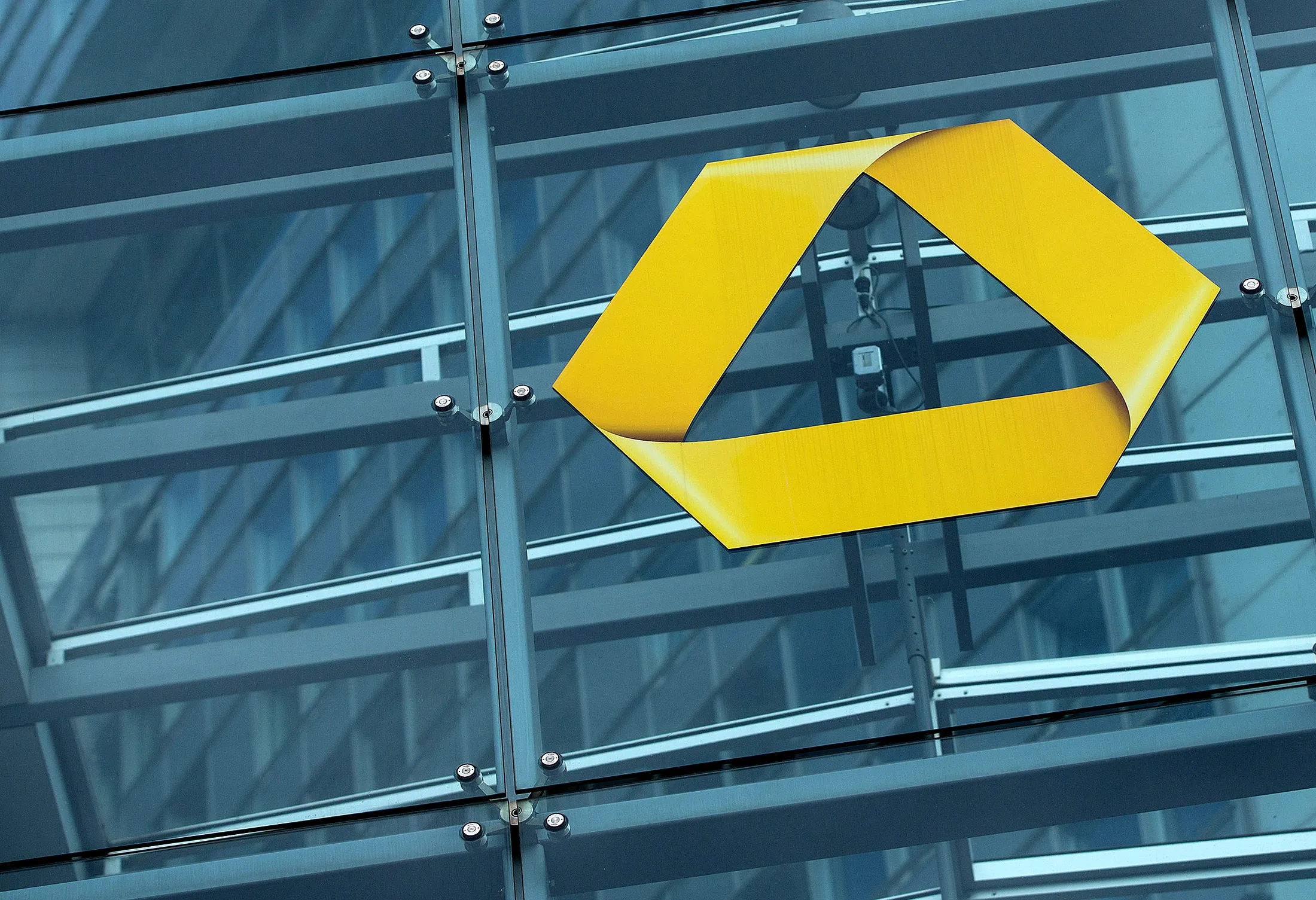 The Commerzbank AG logo sits on the bank's headquarters in Frankfurt.
