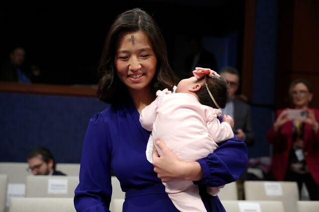 Michelle Wu arrives with her newborn daughter to testify before Congress in Washington, DC, March 5, 2025.