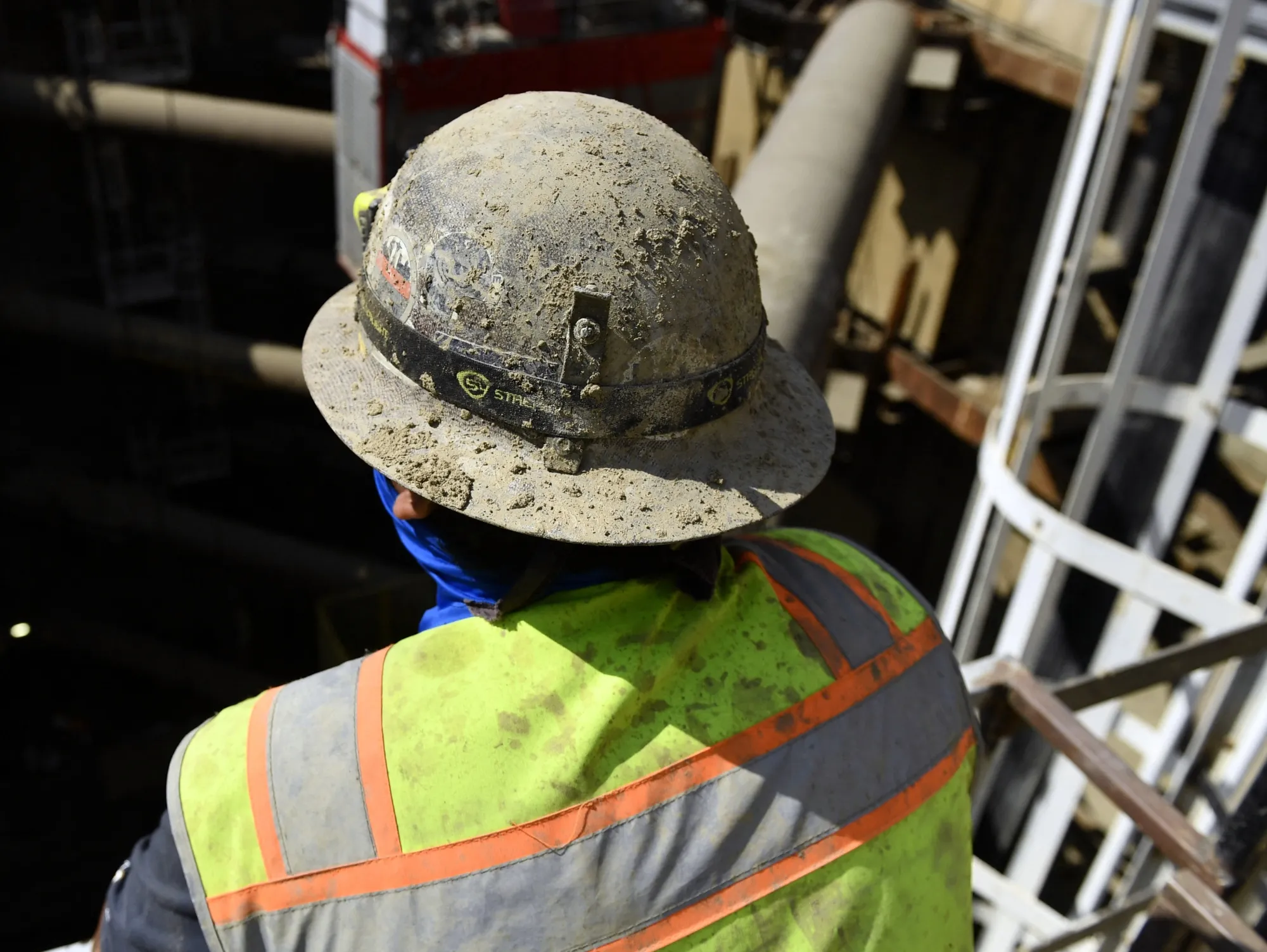 Jobs are holding up, but don’t take off those hard hats yet.