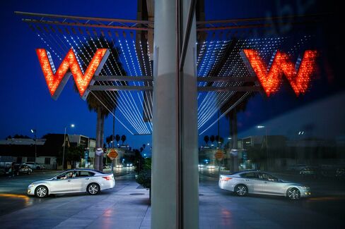 A car exits the driveway of Starwood Hotels & Resorts Worldwide Inc.'s W Hotel Hollywood in Hollywood, Calif.