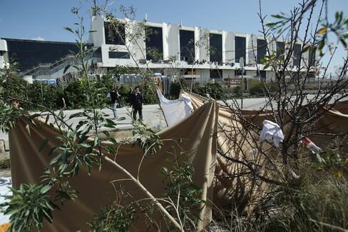 Refugees and migrants at Hellinikon.