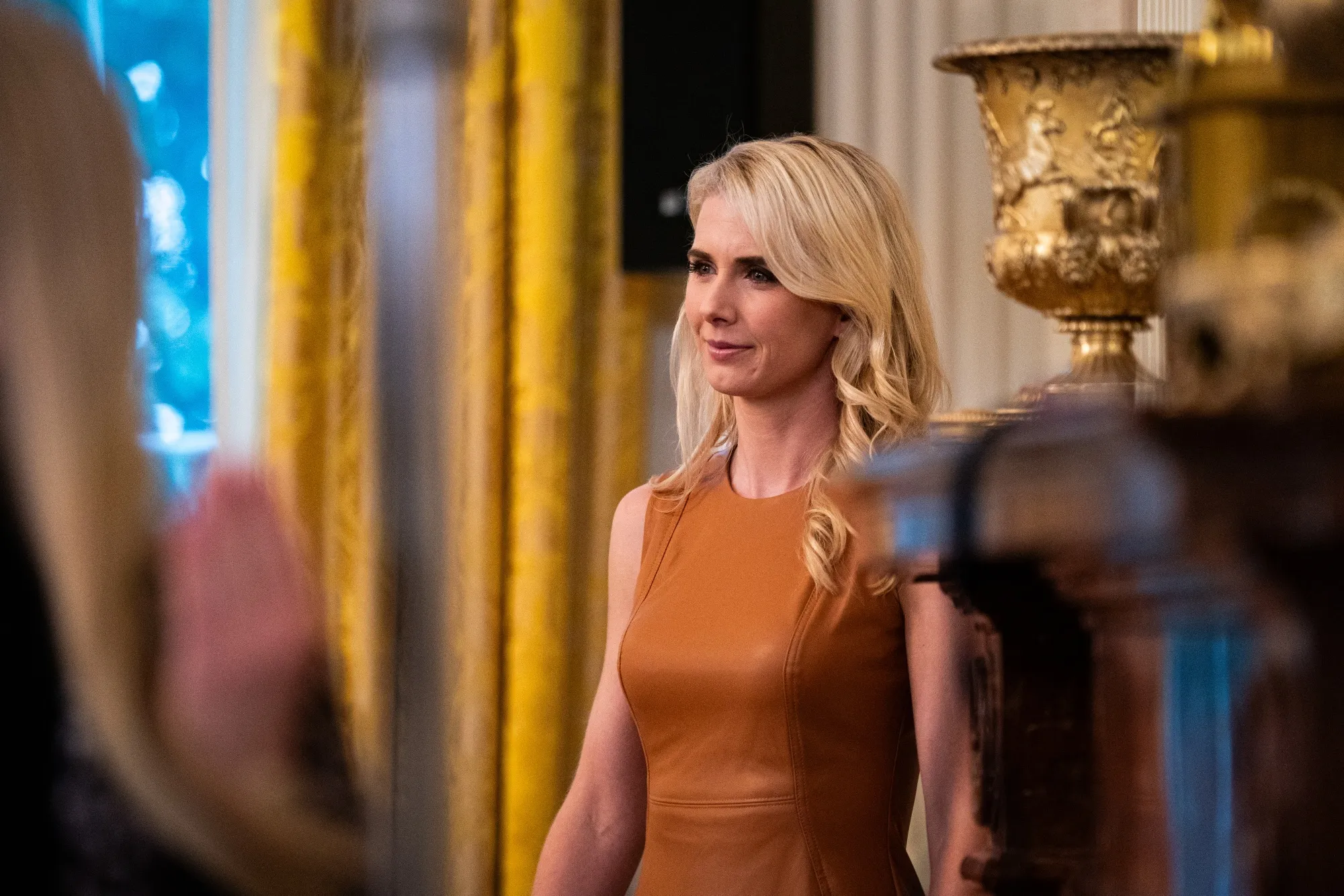 Jon Ossoff criticizes Trump aide Natalie Harp, calling her part of a 'security blanket' for the president; White House responds.