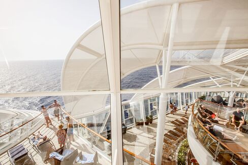 The three-story, adults-only Solarium enclave sits toward the bow of the ship, with four cantilevered whirlpools suspended 136 feet above the ocean.