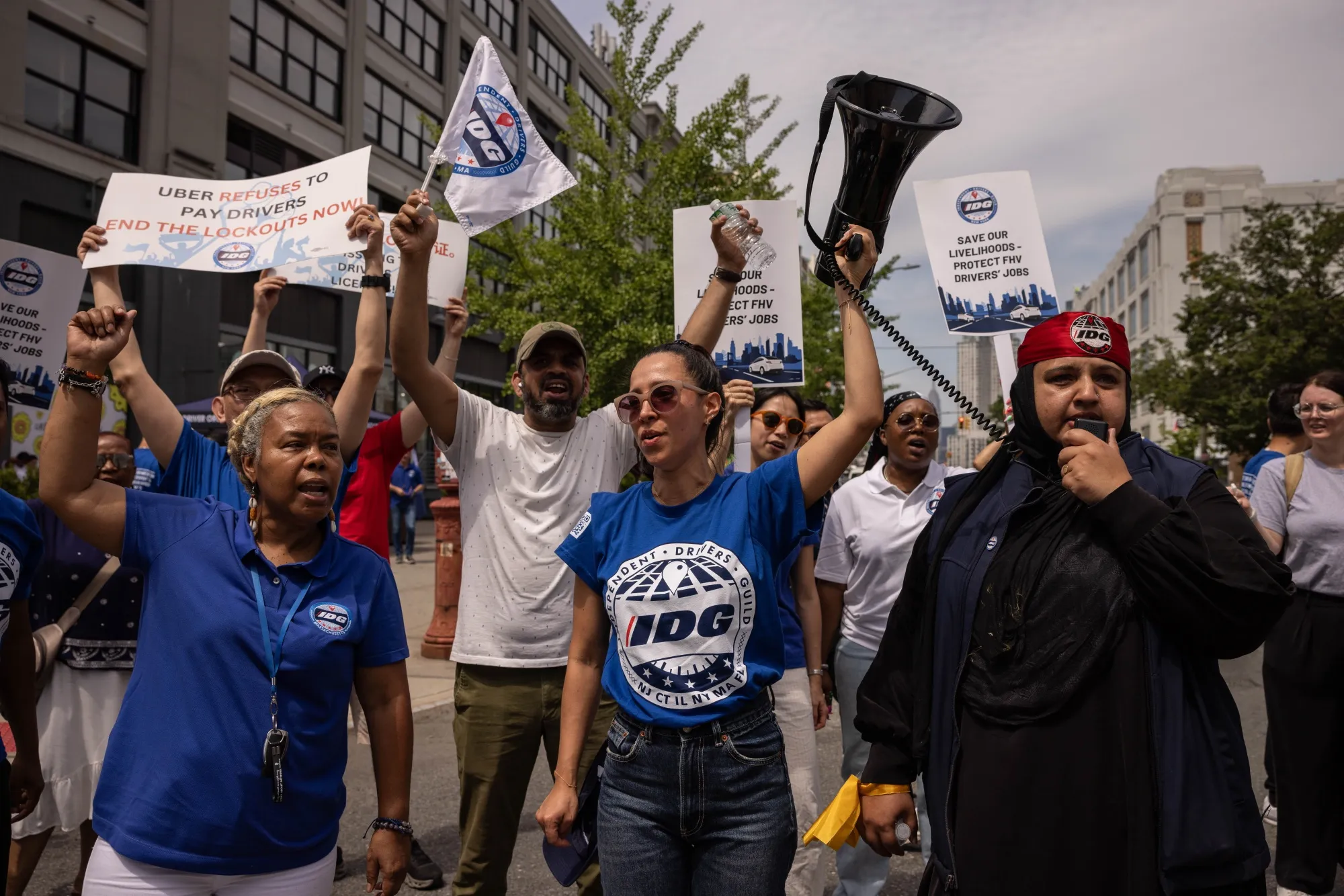 Demonstrators protest outside Uber offices in&nbsp;New York, on June 26.