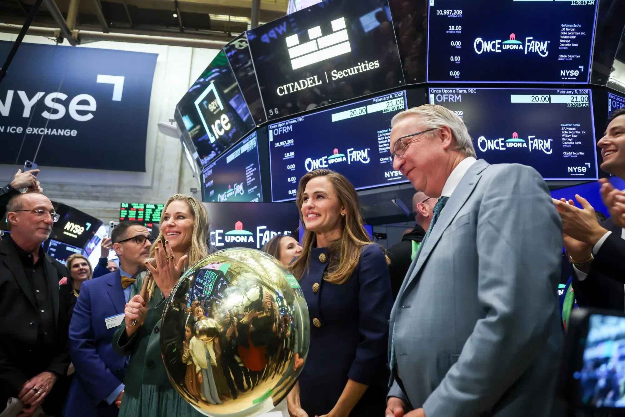 Co-Founders of Once Upon a Farm Cassandra Curtis, left, Jennifer Garner&nbsp;and John Foraker ring a ceremonial bell during the company's IPO on the floor of the New York Stock Exchange on Feb. 6.&nbsp;