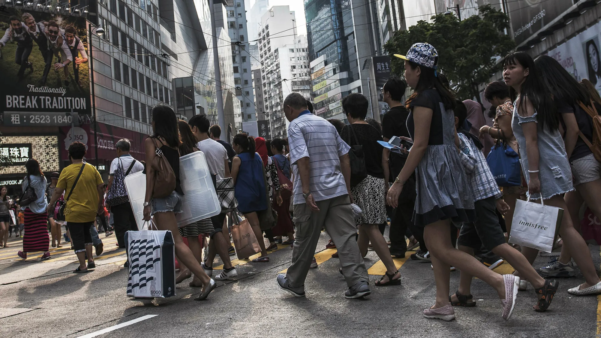 Shoppers In Causeway Bay As Gucci Spars With Hong Kong Landlords Amid Slumping Chinese Demand