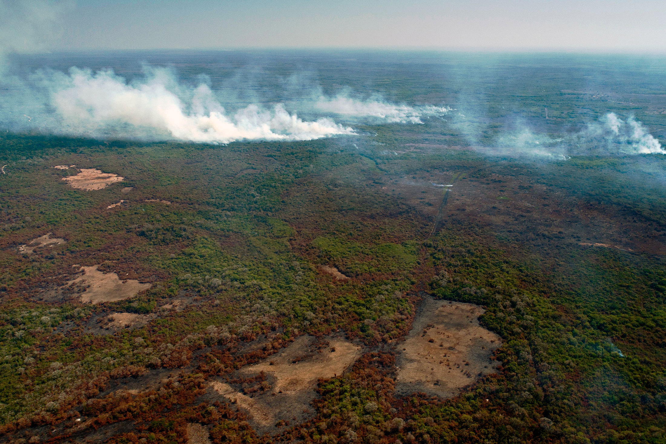 Fires burn in the Pantanal region of Mato Grosso State, Brazil on Aug. 1.