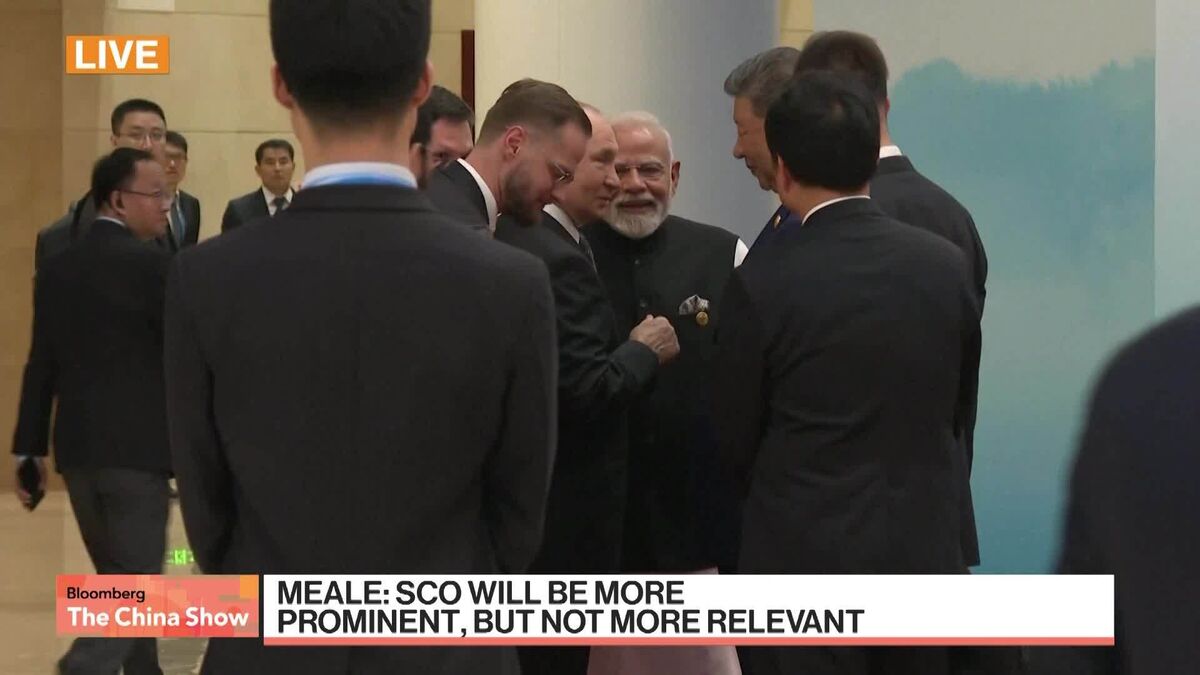Xi, Modi and Putin Huddle at China Security Summit Xi, Modi and Putin Huddle at China Security Summit