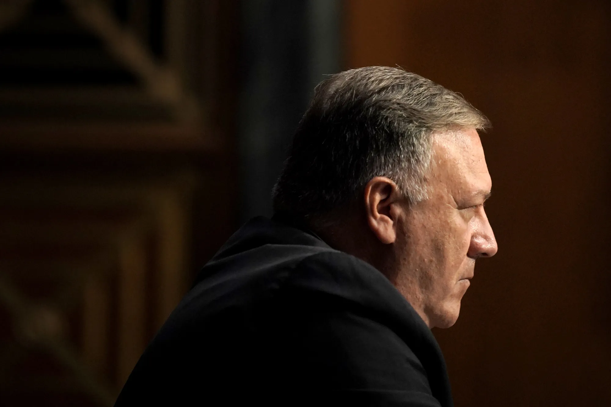 Mike Pompeo, U.S. secretary of state, sits during a Senate Foreign Relations Committee hearing in Washington, D.C., U.S., on Thursday, July 30, 2020. Pompeo is testifying on the State Department's fiscal 2021 budget request.