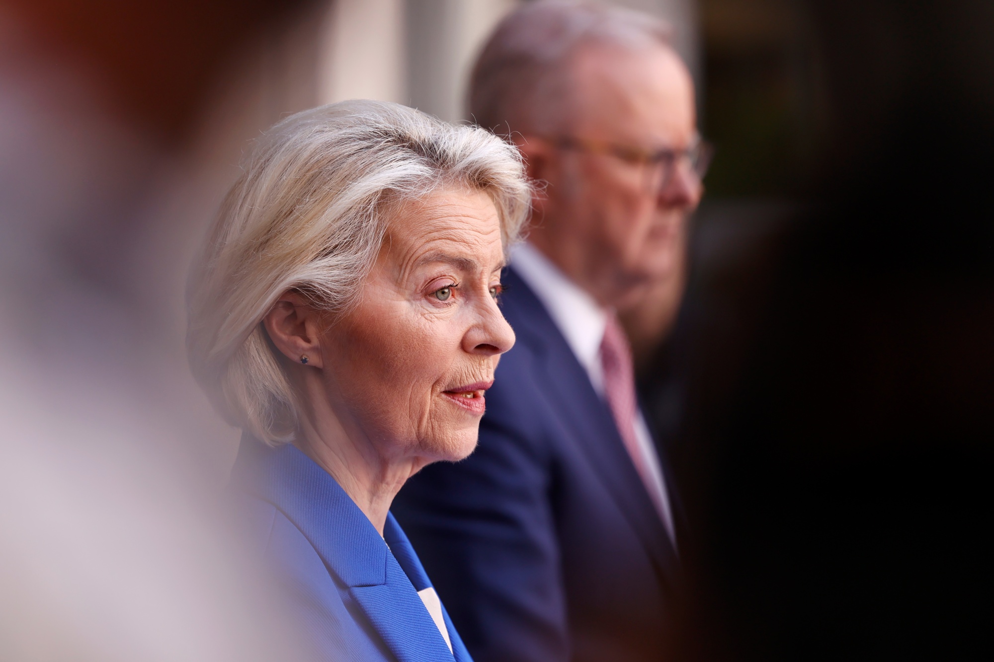 Ursula von der Leyen, president of the European Commission, front, and Anthony Albanese, Australia's prime minister, during a news conference at Parliament House in Canberra, Australia, on Tuesday, March 24, 2026. The European Union and Australia agreed to a free-trade deal, wrapping up almost a decade of talks as the two sides push to tighten ties and reinvigorate a rules-based order that’s under assault from the Trump administration. Photographer: Hilary Wardhaugh/Bloomberg