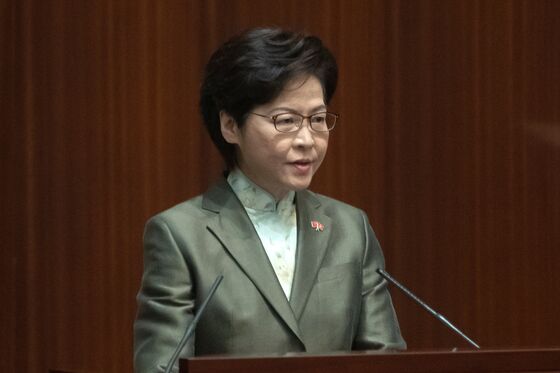 Hong Kong’s Leader Lays Out Future Tied to Beijing After Unrest