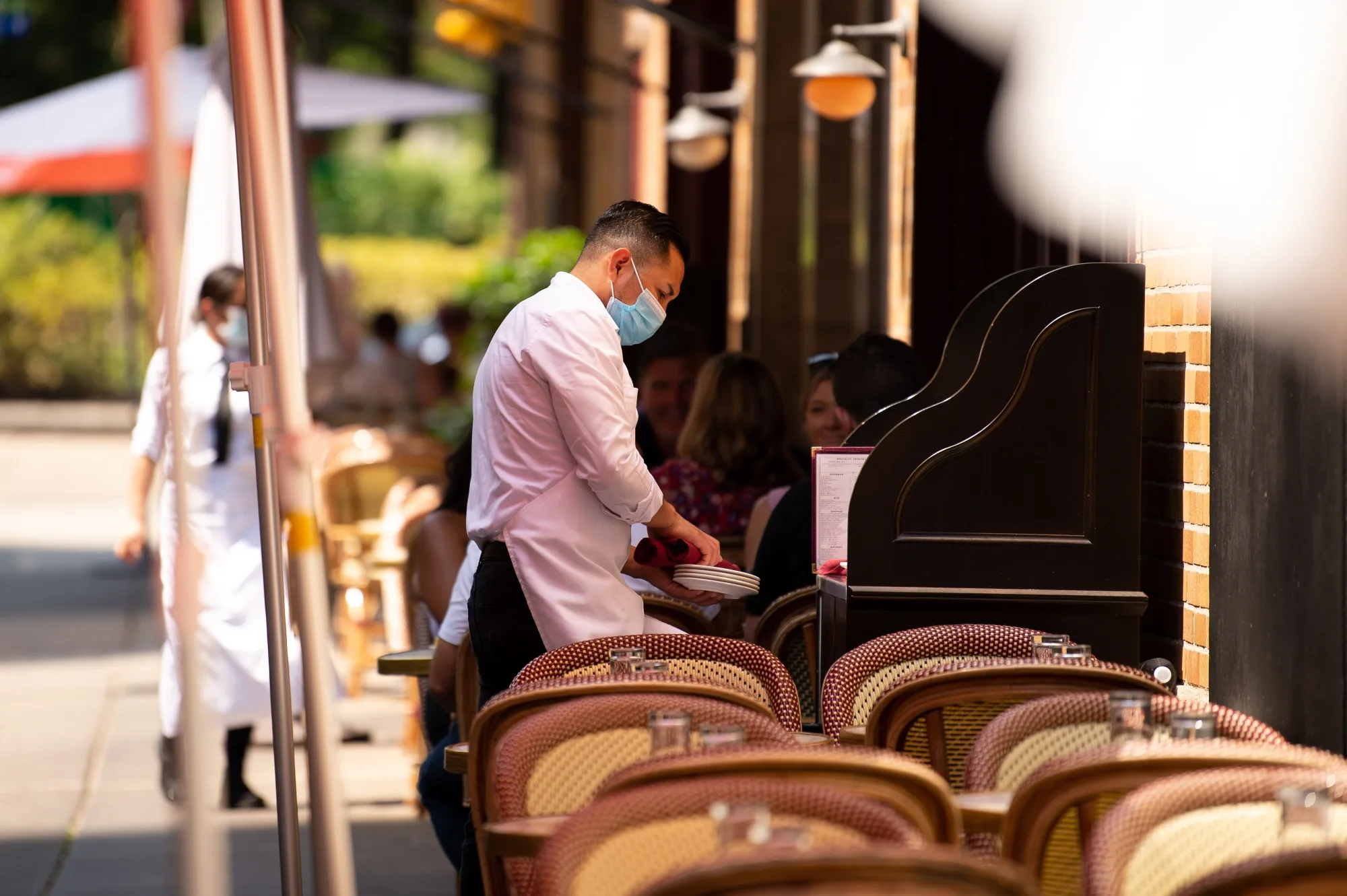 A server works at a restaurant in Philadelphia, Pennsylvania.