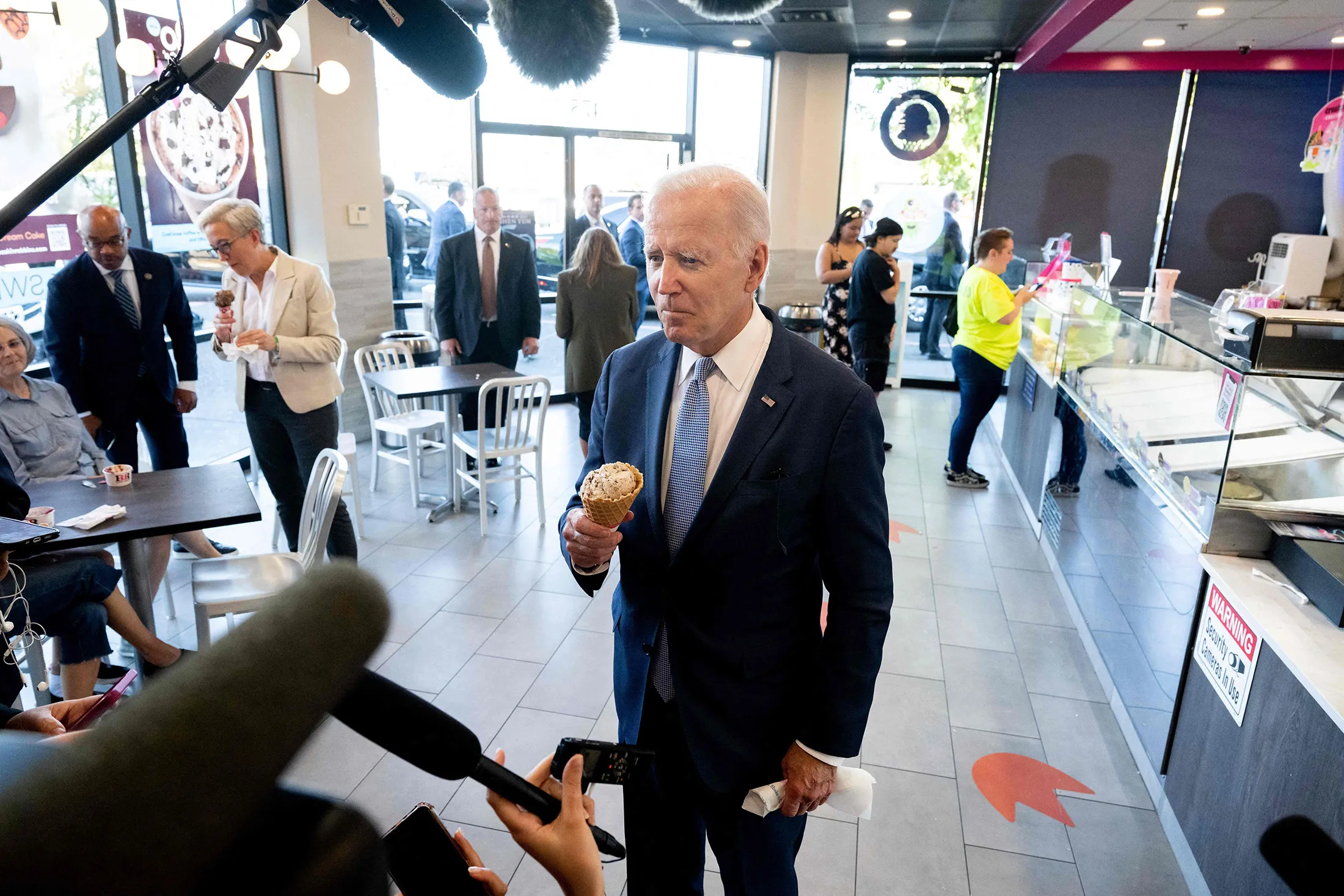 President Joe Biden speaks to the press as he stops for ice cream at Baskin Robbins in Portland, Oregon, Oct.&nbsp;15.