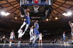 RJ Barrett of the New York Knicks dunks the ball against the Sacramento Kings at Madison Square Garden in New York City on Nov. 3. 