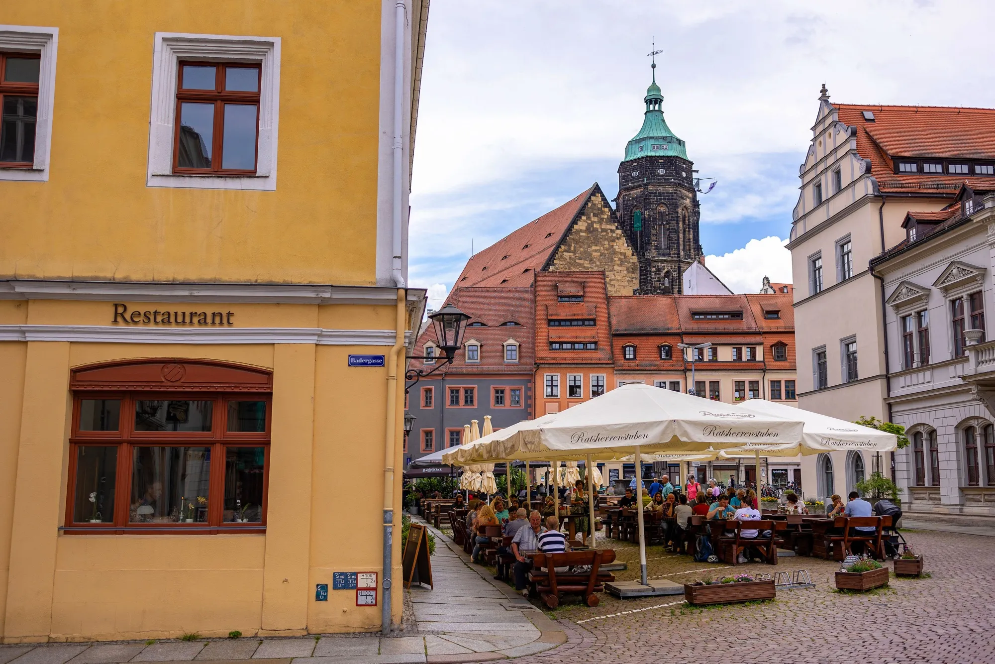 Customers on a restaurant terrace in Pirna in Saxon Switzerland, in Germany.&nbsp;