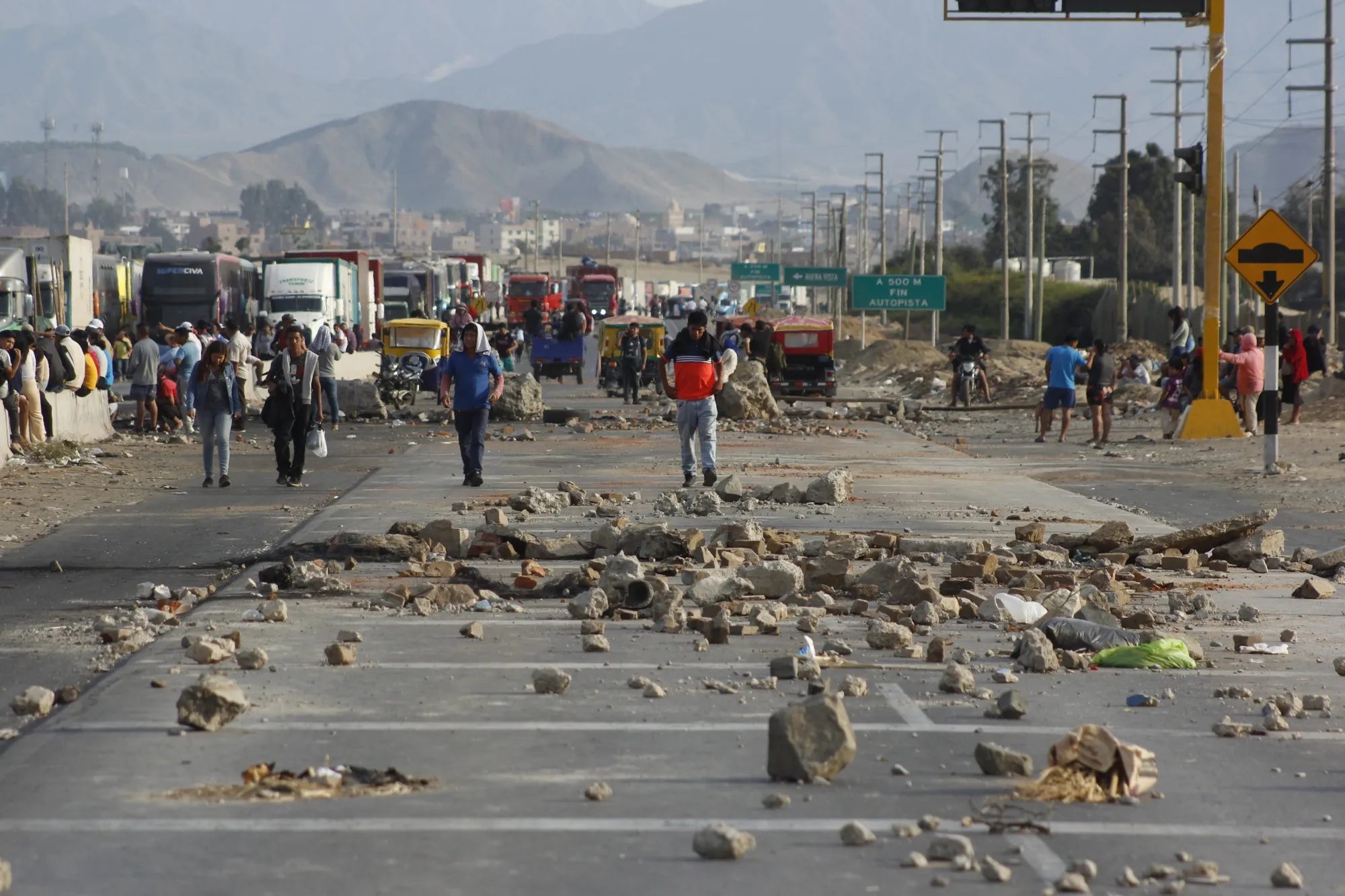 Demonstrators block the Panamericana Norte highway during protests in Trujillo, Peru, on Dec. 14.